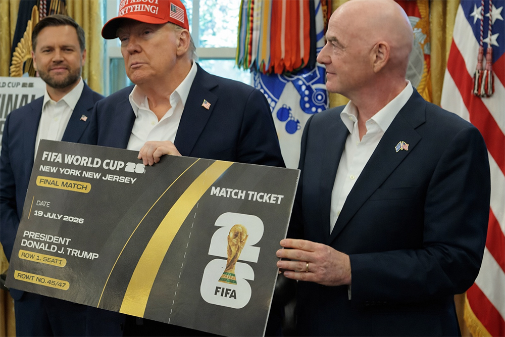Photo of Trump and Infantino holding an example World Cup ticket